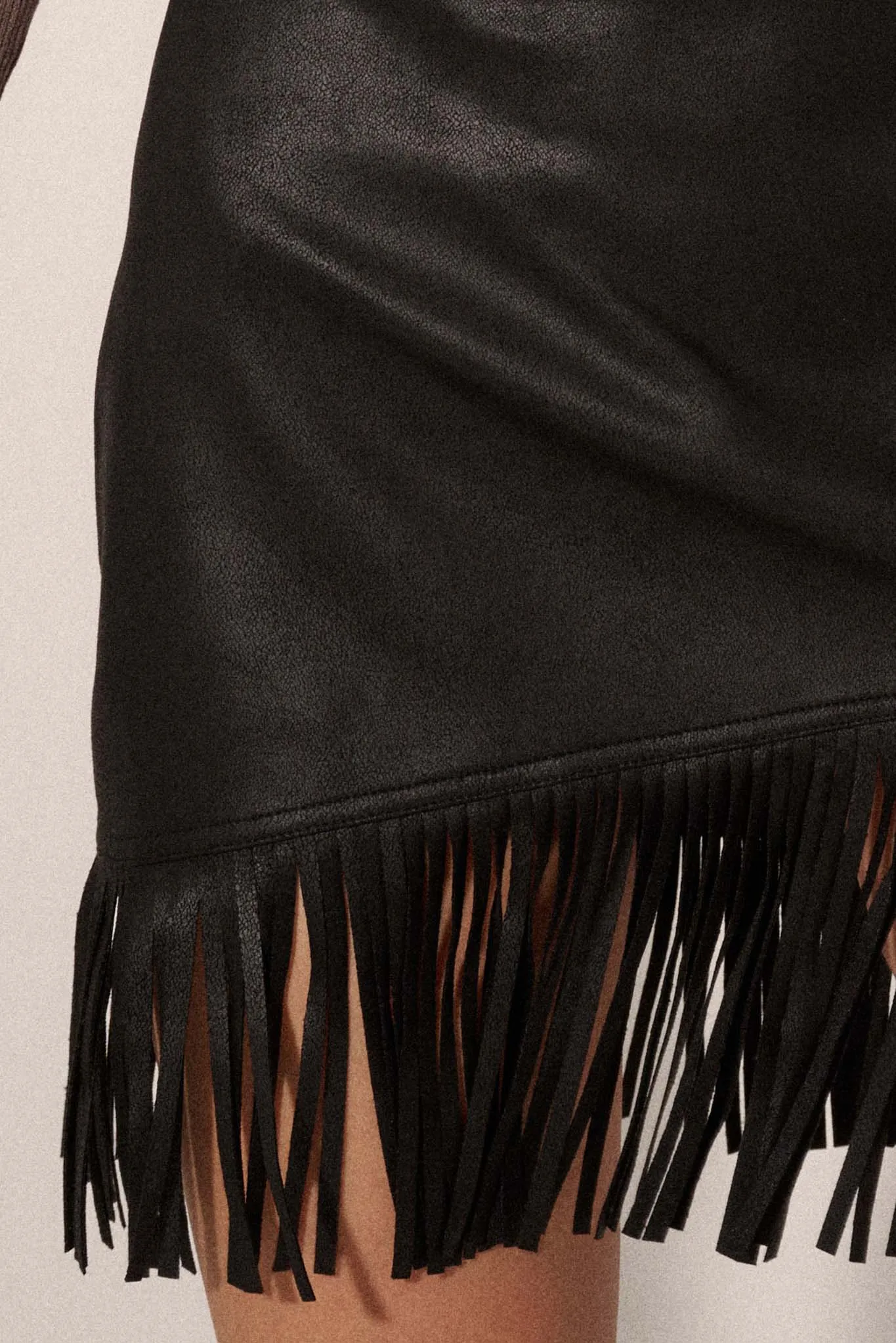 Center Stage Vegan Leather Fringe Mini Skirt